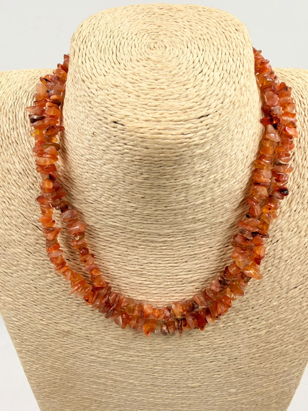 Natural carnelian chip necklace single strand view showing warm orange-red gemstone chips