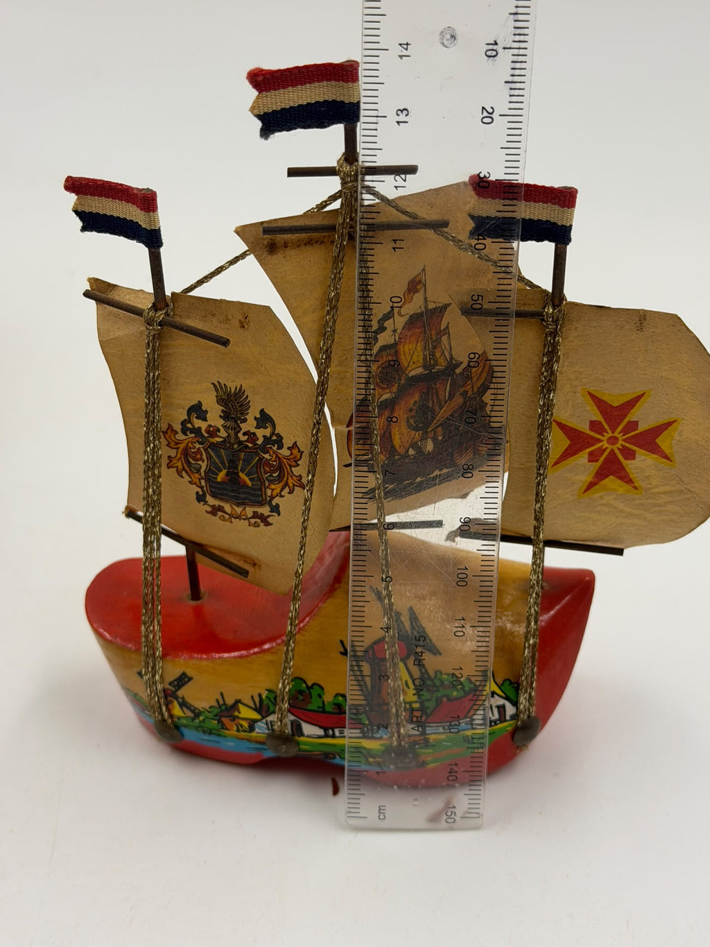 Dutch clog ship – back side view showing plain sails and flags