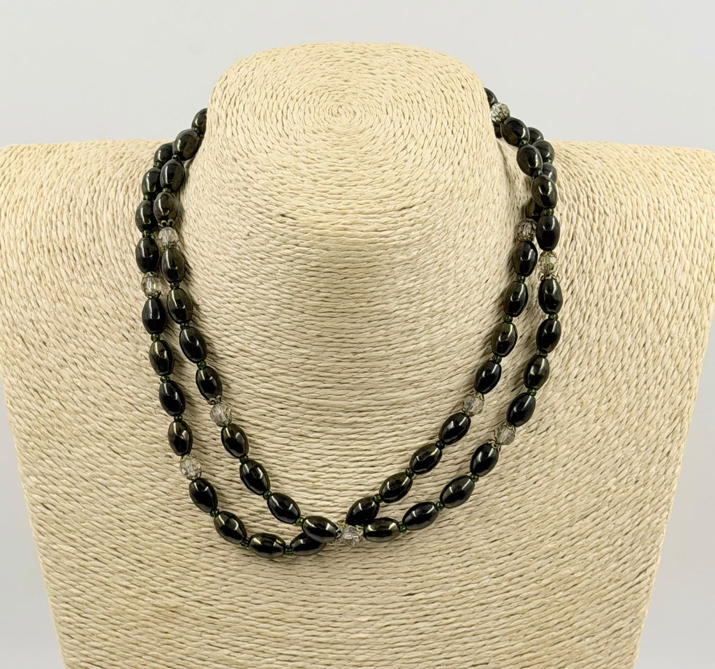 Necklace in hand close up