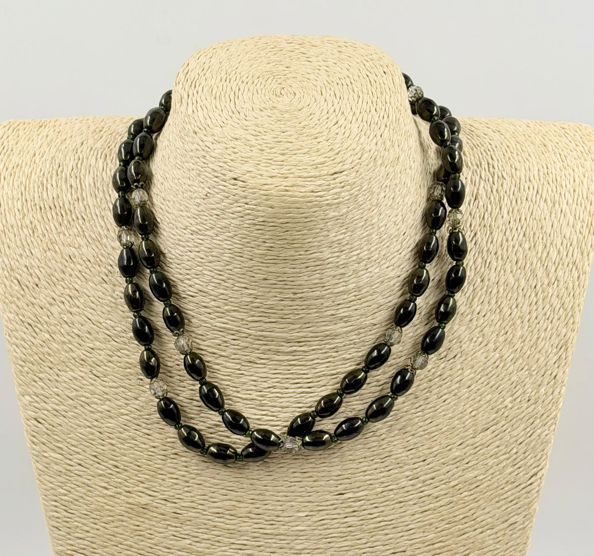 Necklace in hand close up