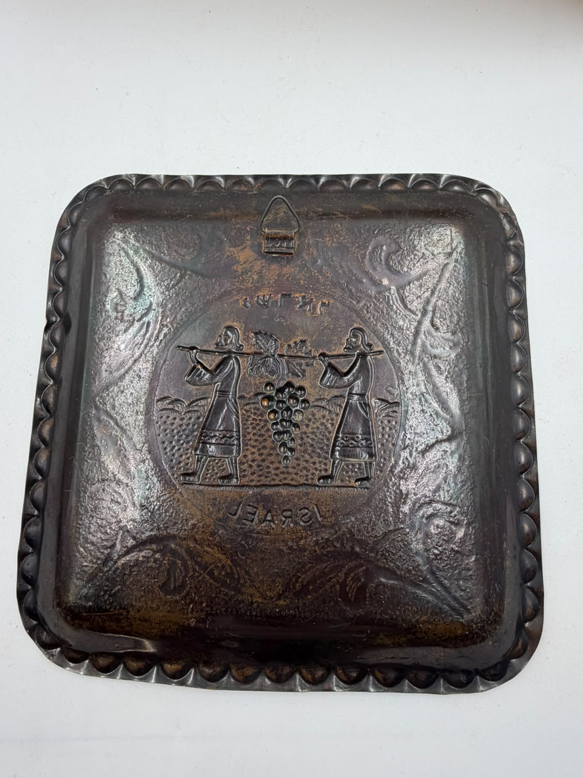 Vintage Israeli copper tray – front view with embossed grape harvest scene and ISRAEL inscription