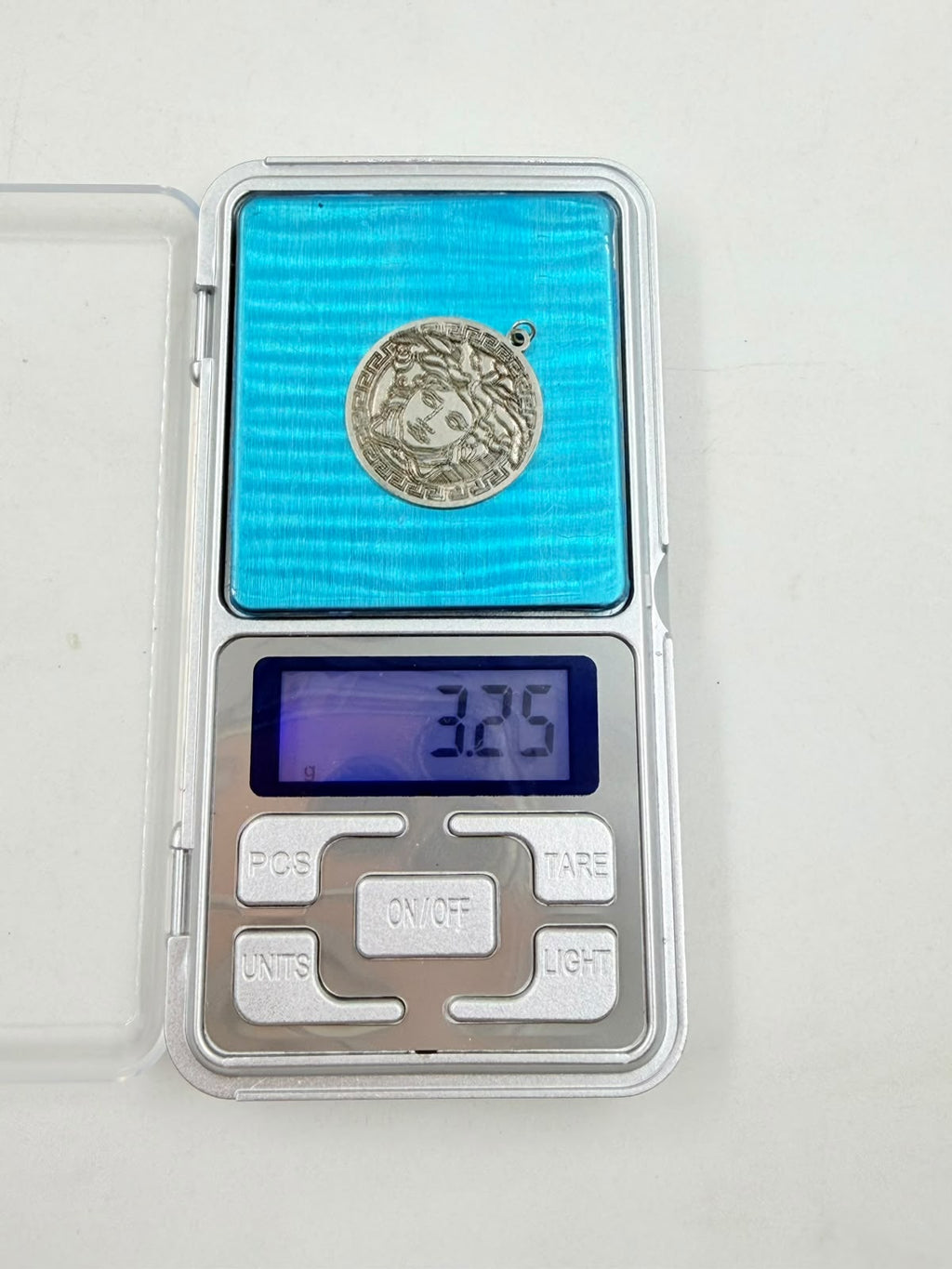 Sterling silver 925 Medusa medallion pendant - front view white background