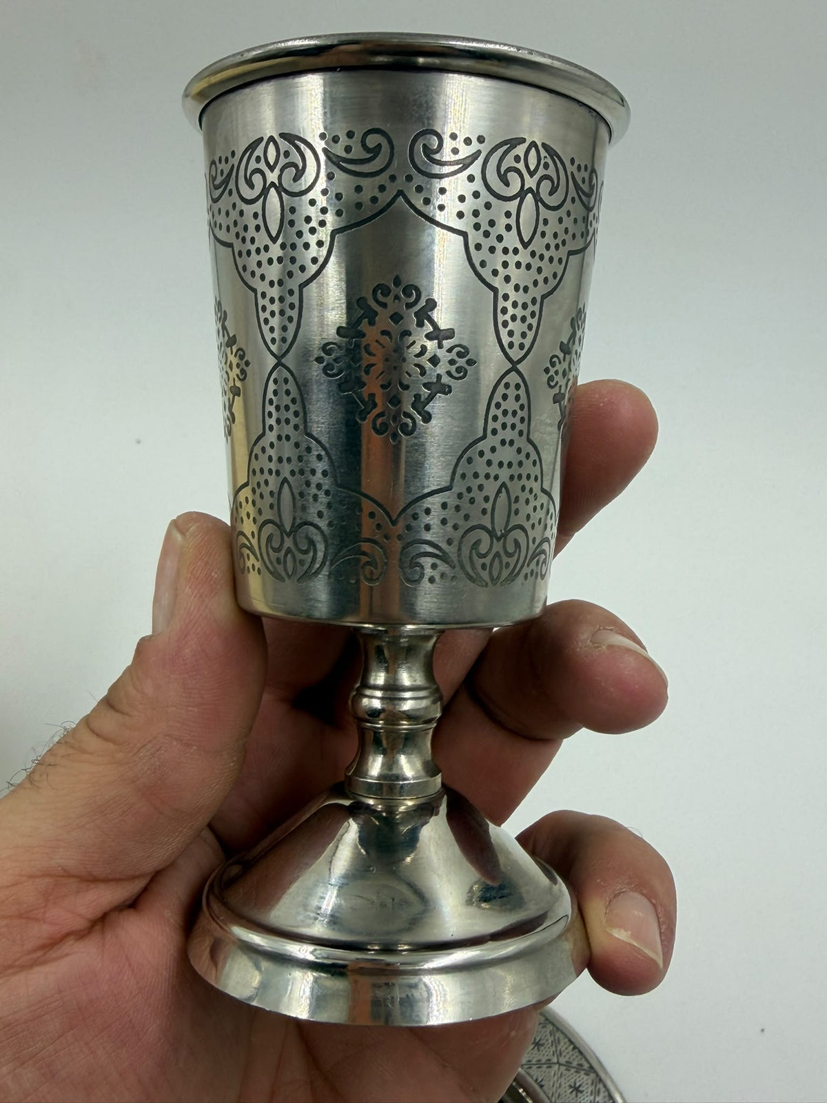 Israeli silver-plated Kiddush cup and saucer set full front view on white background