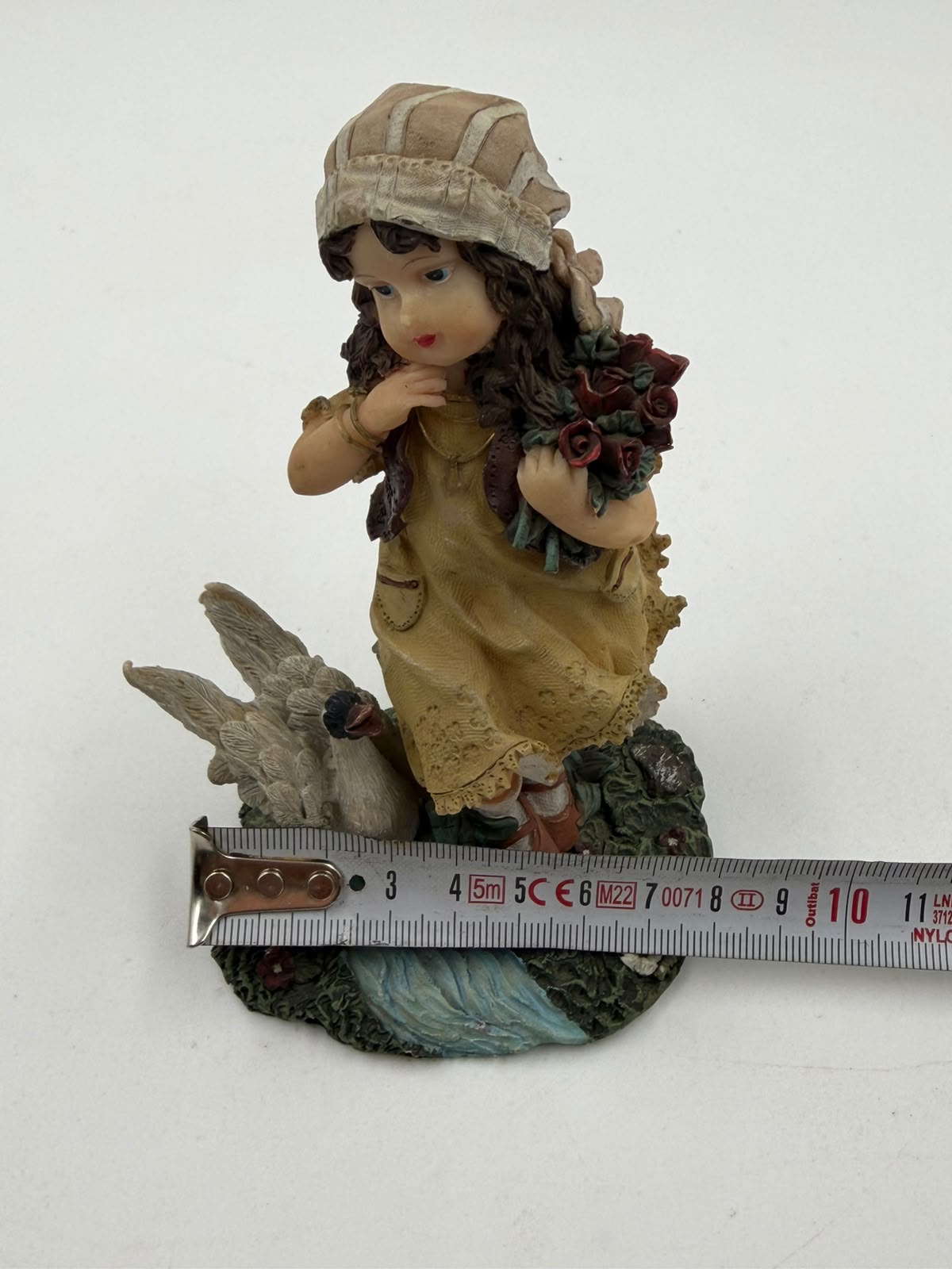 Vintage resin girl with goose figurine – side view right