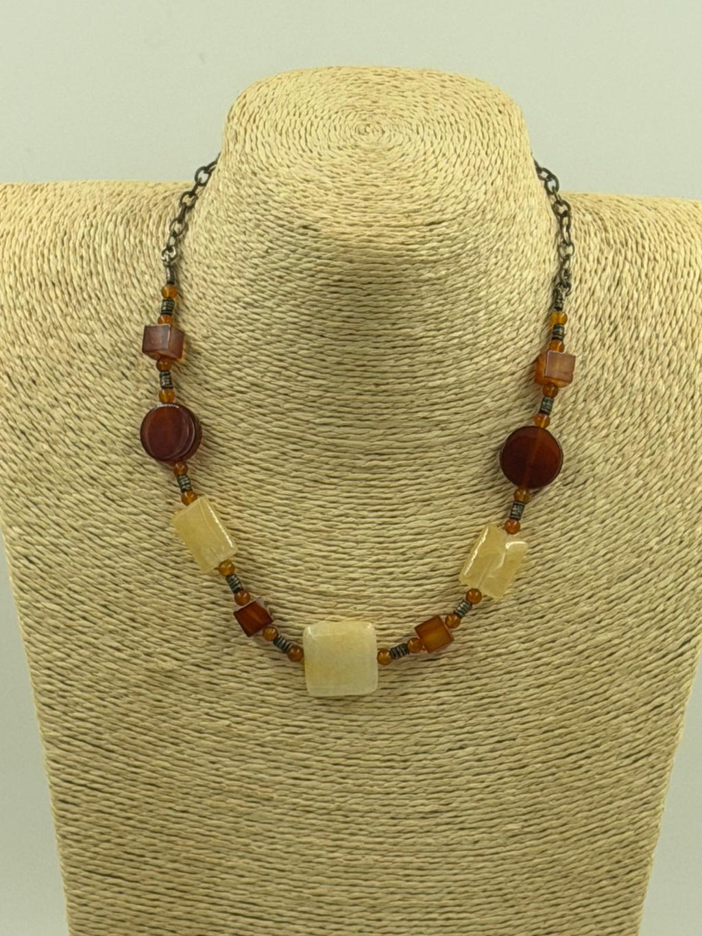 Model wearing vintage carnelian and yellow onyx necklace