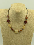 Model wearing vintage carnelian and yellow onyx necklace