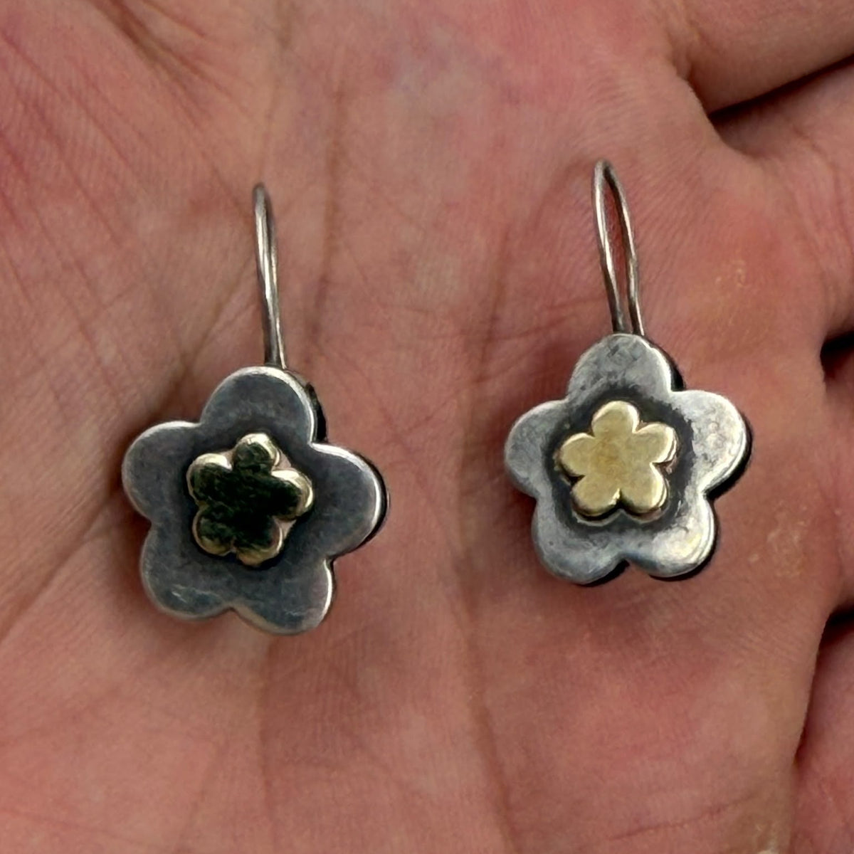 925 silver flower earrings DIANE held in hand showing actual size and scale of 1.5cm flower