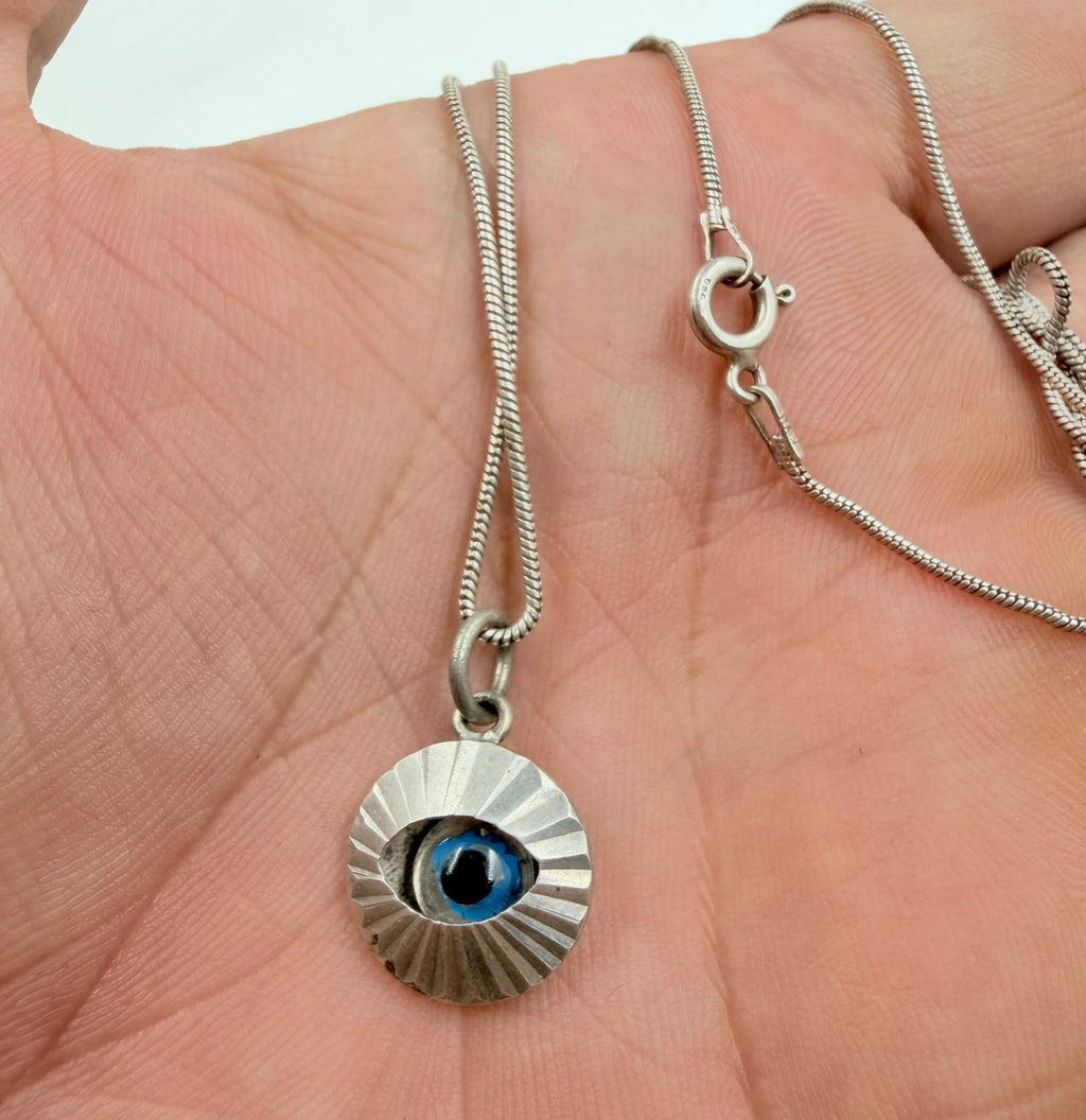 925 Italian sterling silver evil eye necklace on white background