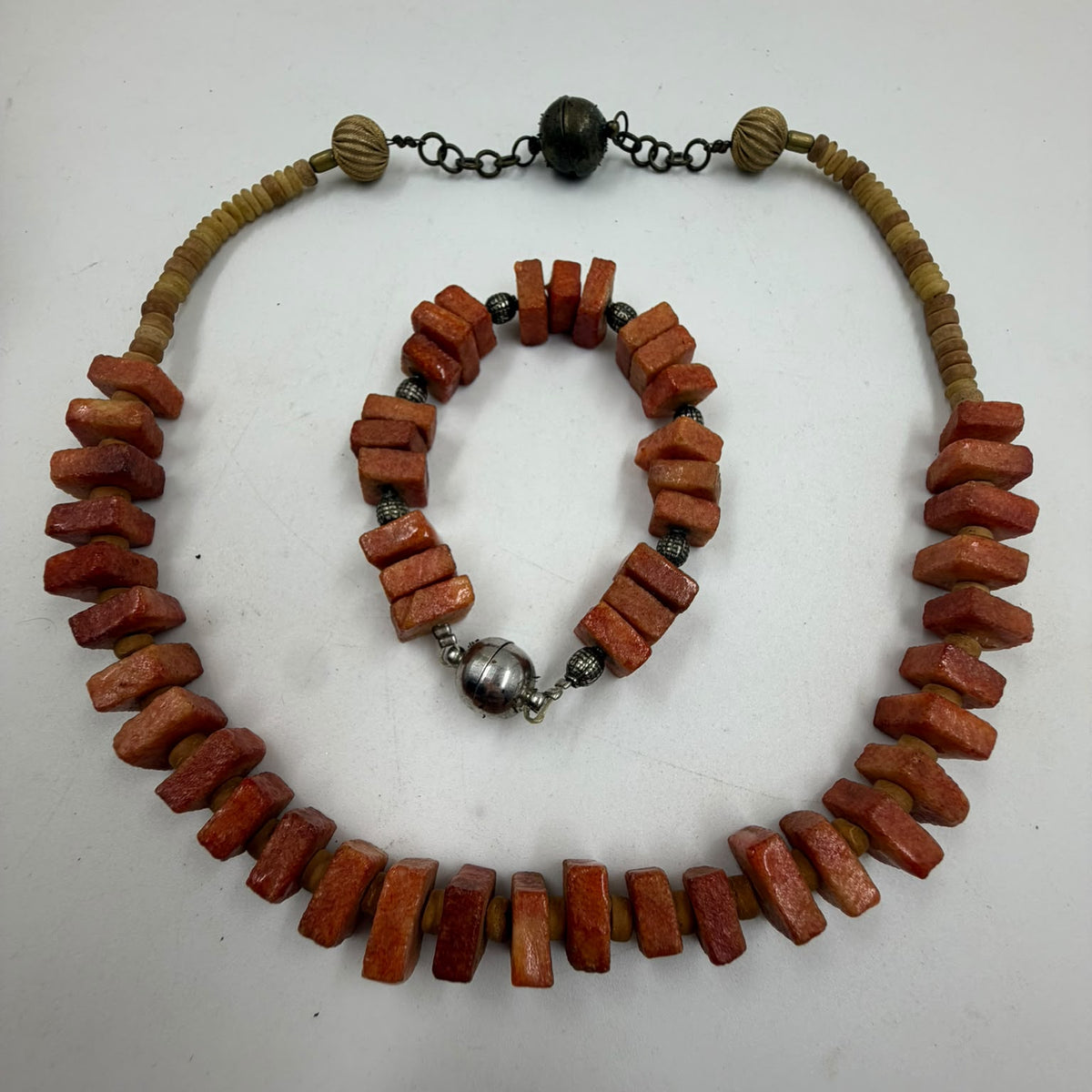 Natural coral necklace detail - oxidized silver spacer bead close-up