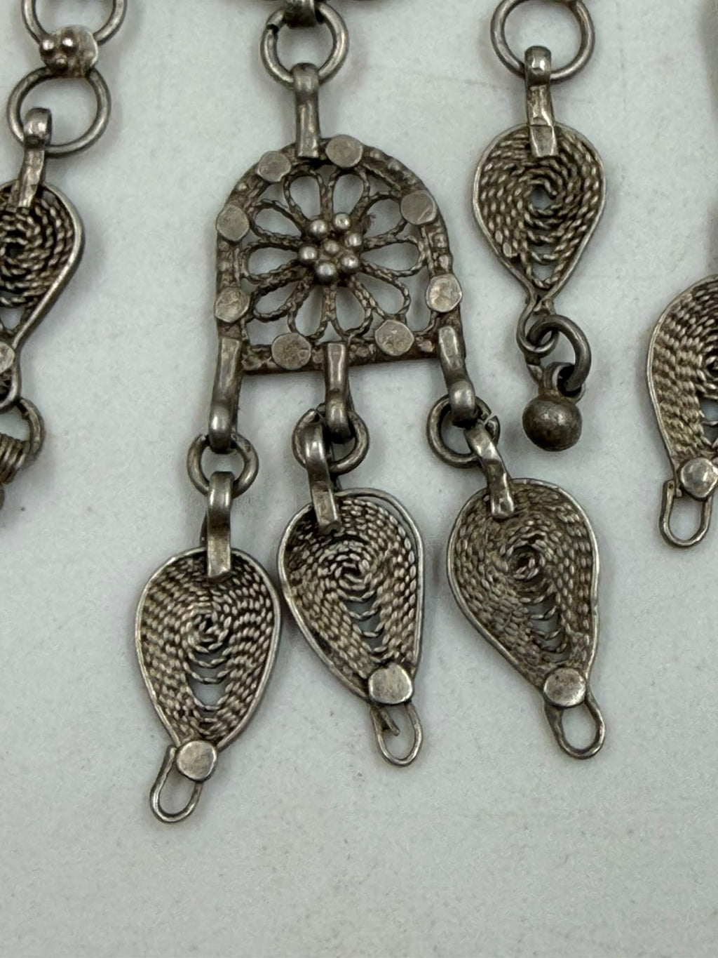 Antique Yemeni silver filigree necklace on mannequin close-up bib