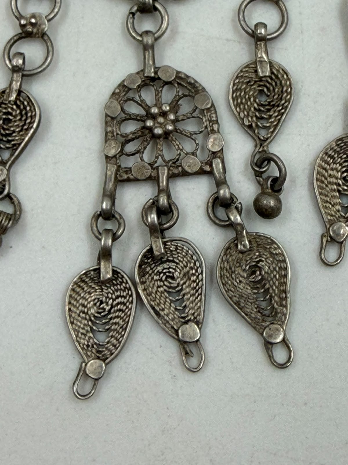 Antique Yemeni silver filigree necklace on mannequin close-up bib