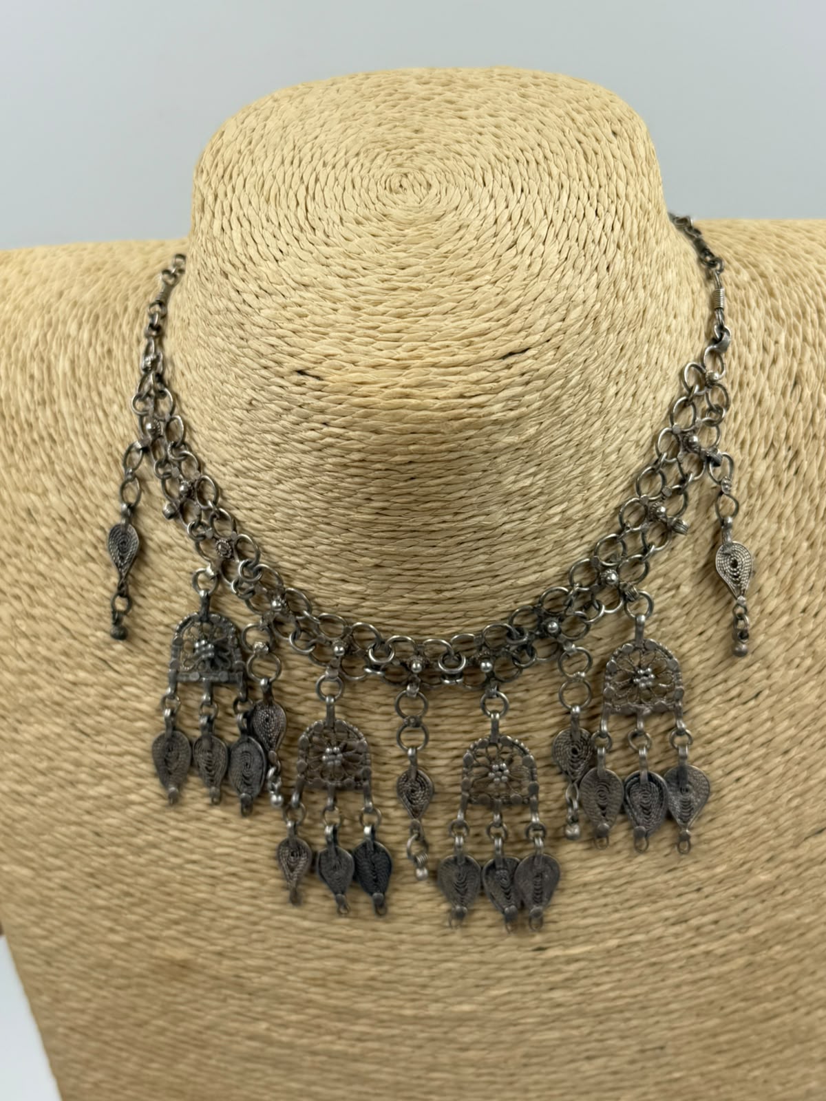Antique Yemeni silver filigree necklace on mannequin side view
