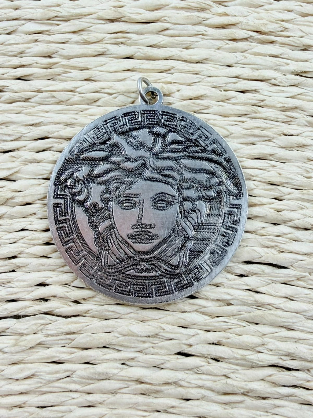 Medusa pendant back view - smooth plain silver reverse