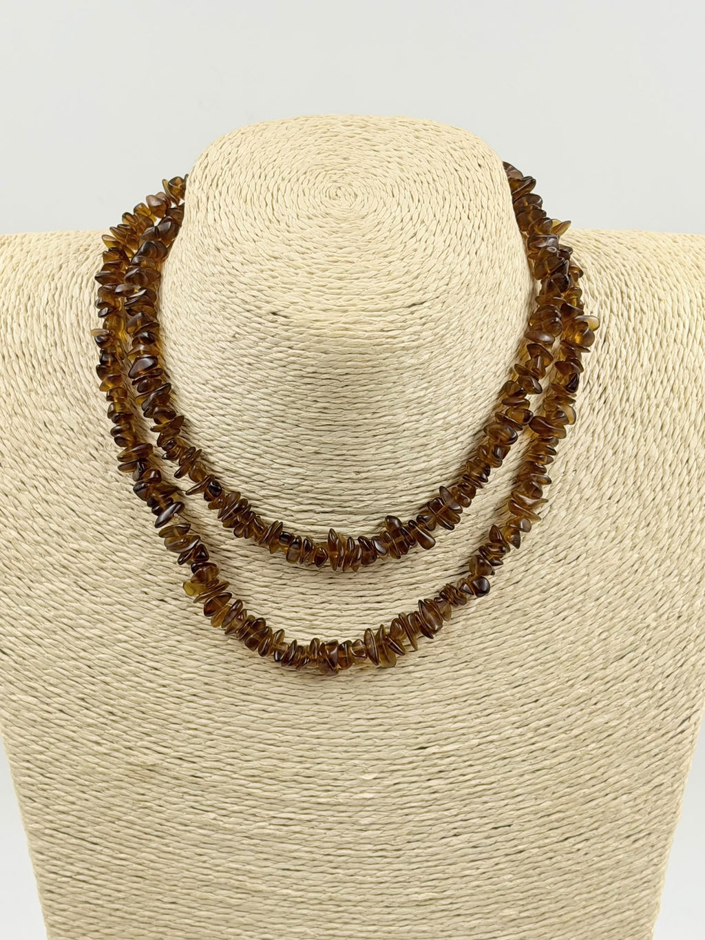 Natural brown agate chip necklace close up showing gold clasp detail