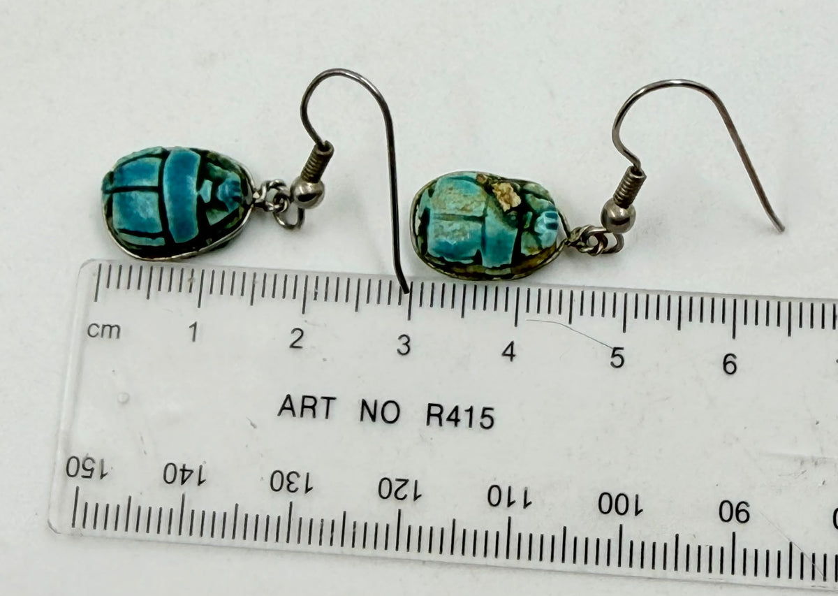 Earrings next to ruler showing approx 3cm total length
