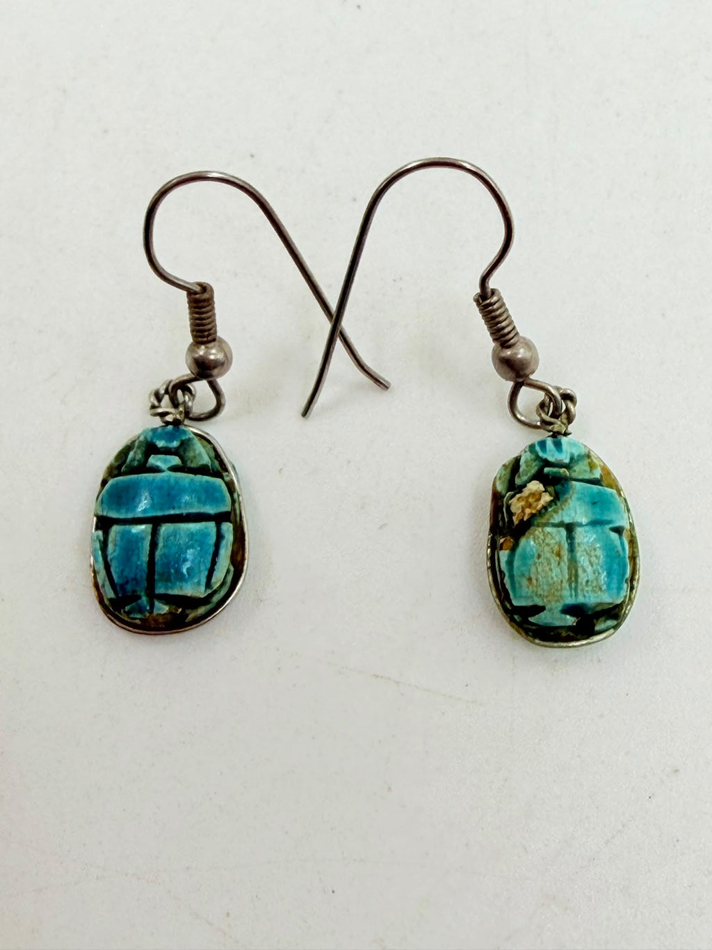 Vintage Egyptian turquoise faience scarab earrings pair - front view white background