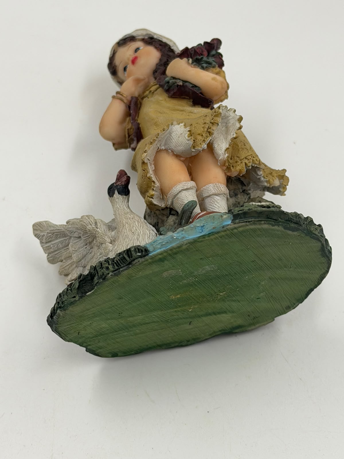 Vintage resin girl with goose figurine – full front view clean