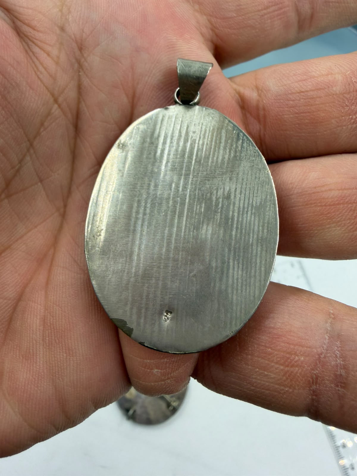 925 silver Three Graces cameo pendant suspended showing full front and twisted rope silver frame
