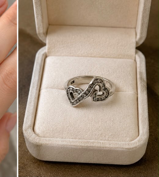Sterling silver 925 double heart ring close-up showing zircon stones