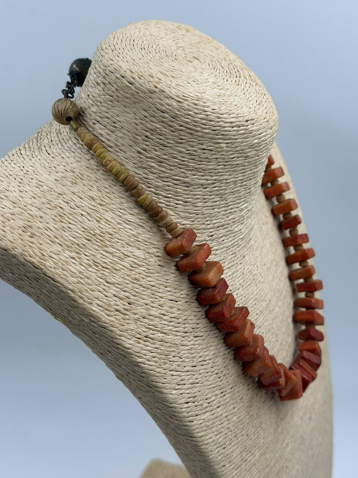 Natural coral necklace and bracelet set laid flat - full overview