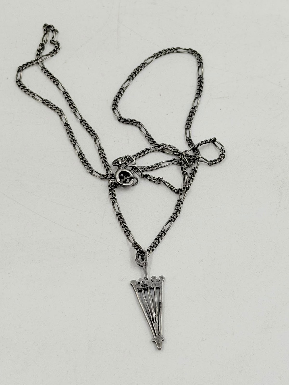 925 Italian sterling silver umbrella pendant close-up in hand
