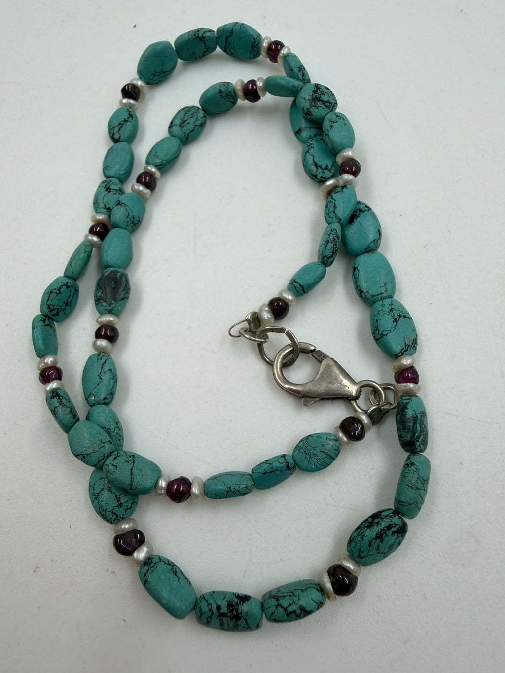 925 sterling silver lobster clasp hallmark close-up on turquoise necklace