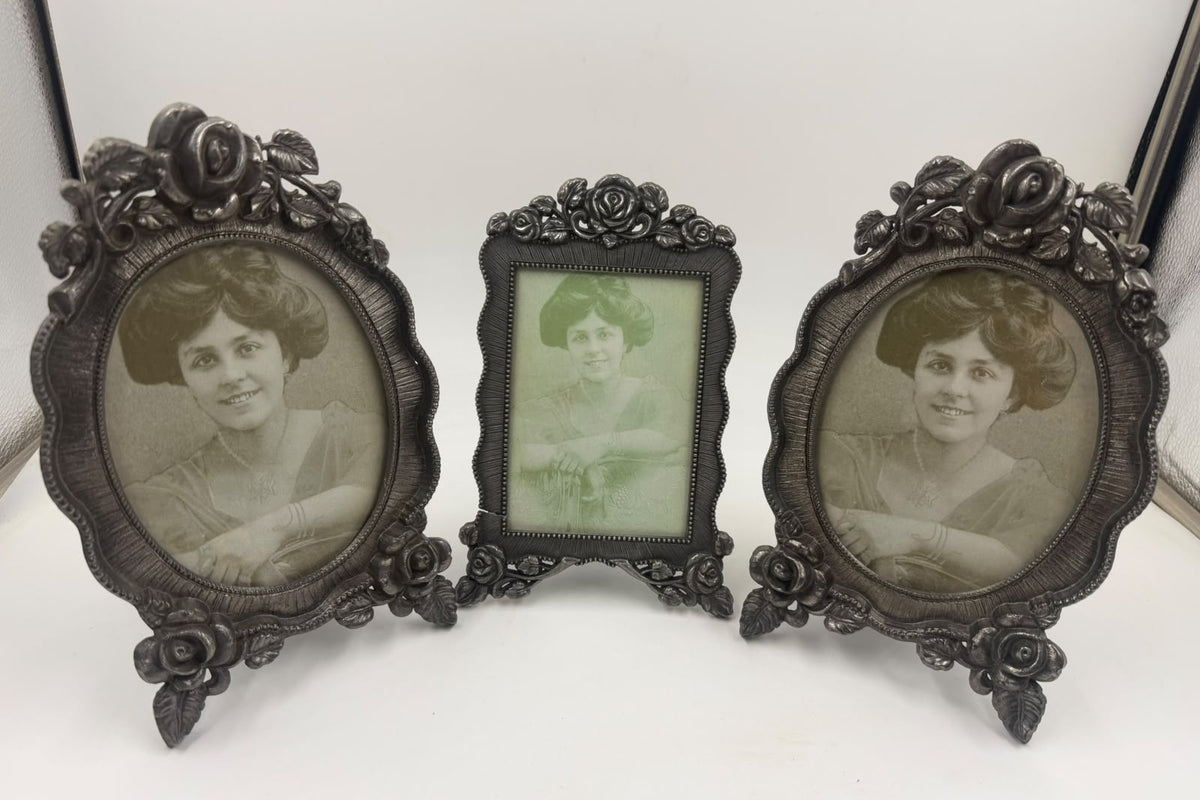 Pewter photo frame rose and leaf decoration detail