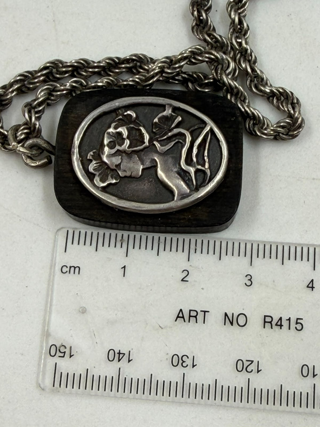 Cameo pendant on mannequin single strand view