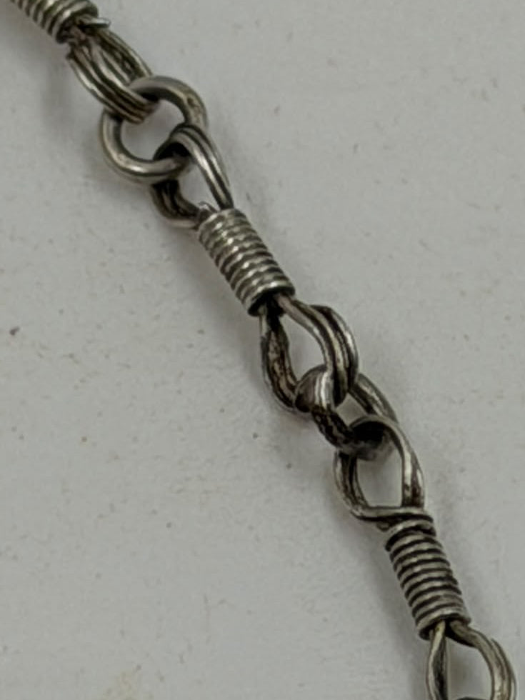 Antique Yemeni silver filigree teardrop drop charms close-up