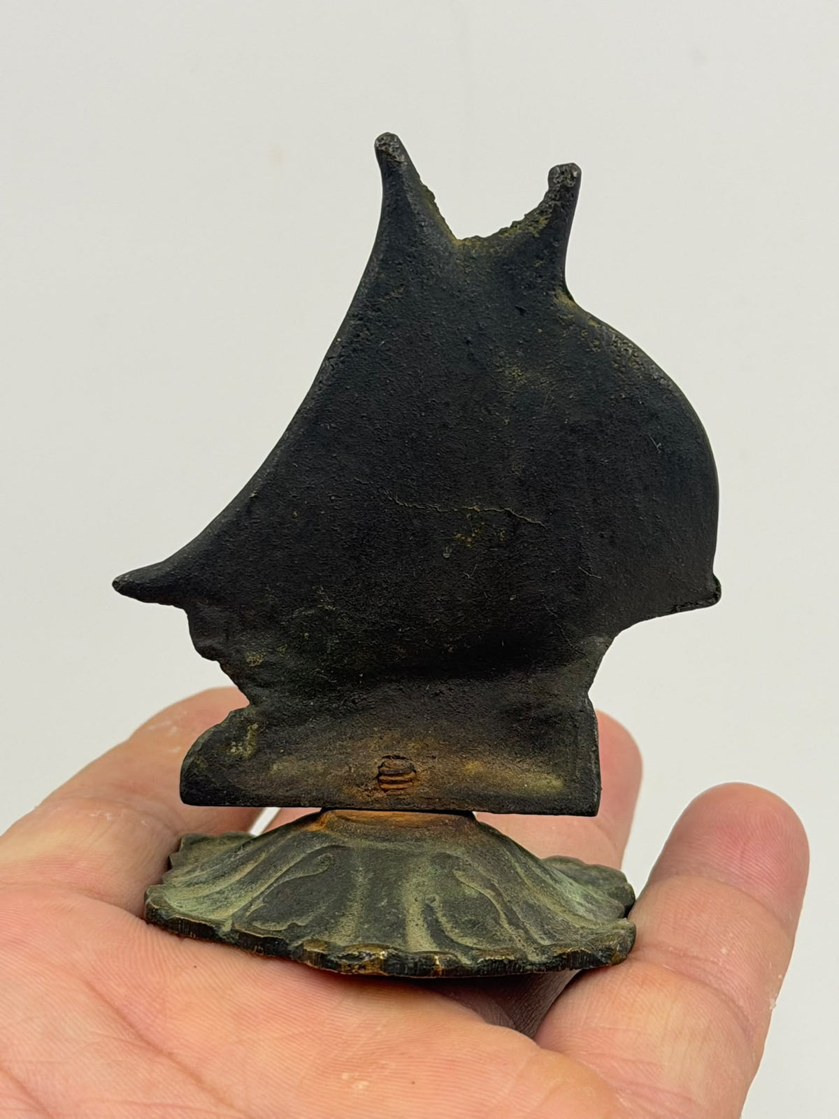 Antique brass sailboat figurine – width measurement with ruler
