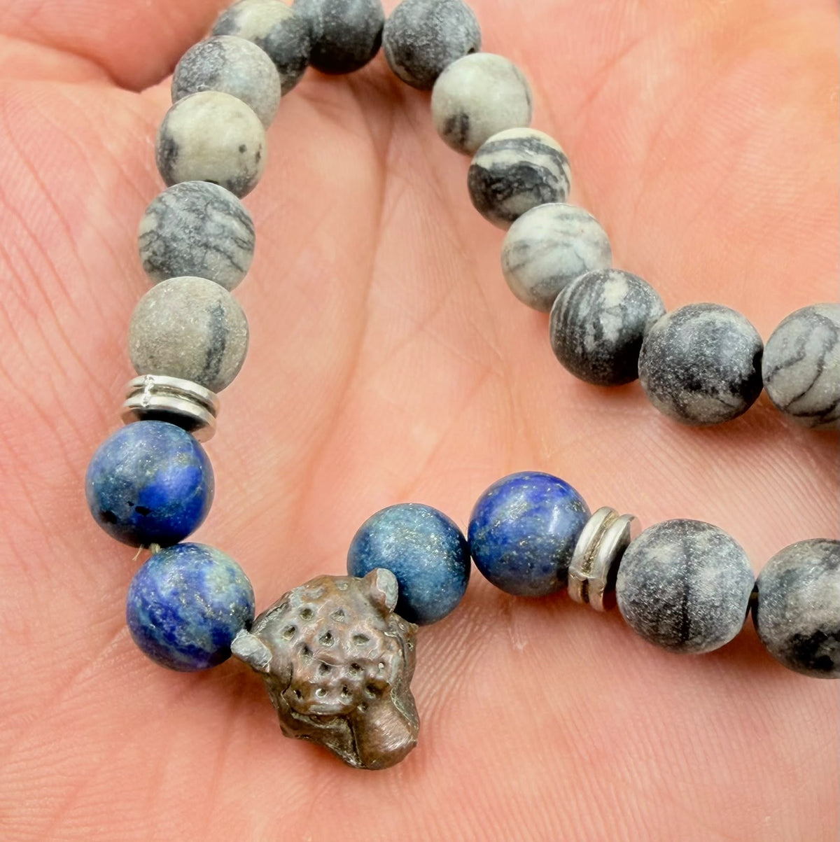 Bracelet beads close up in hand