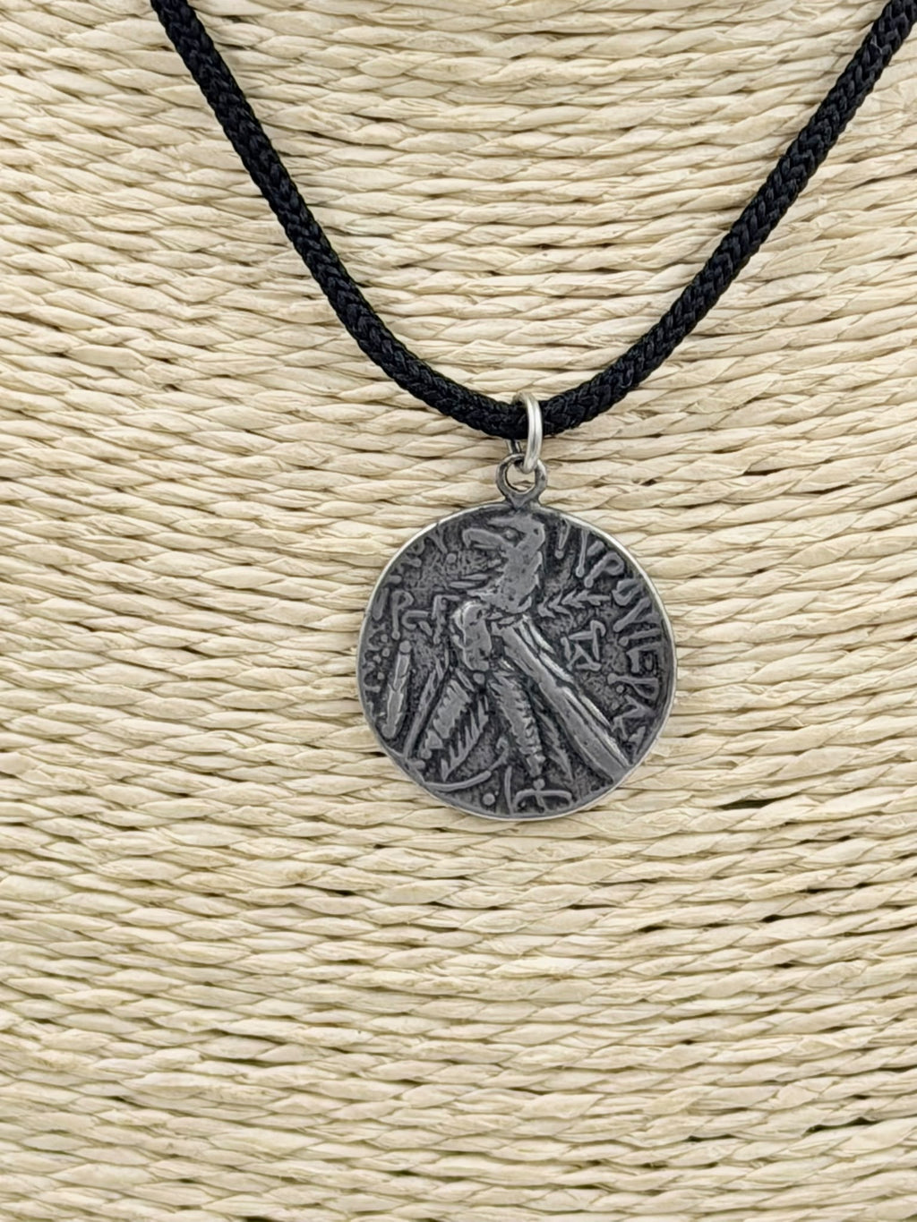 800 silver antique coin pendant necklace on wicker display