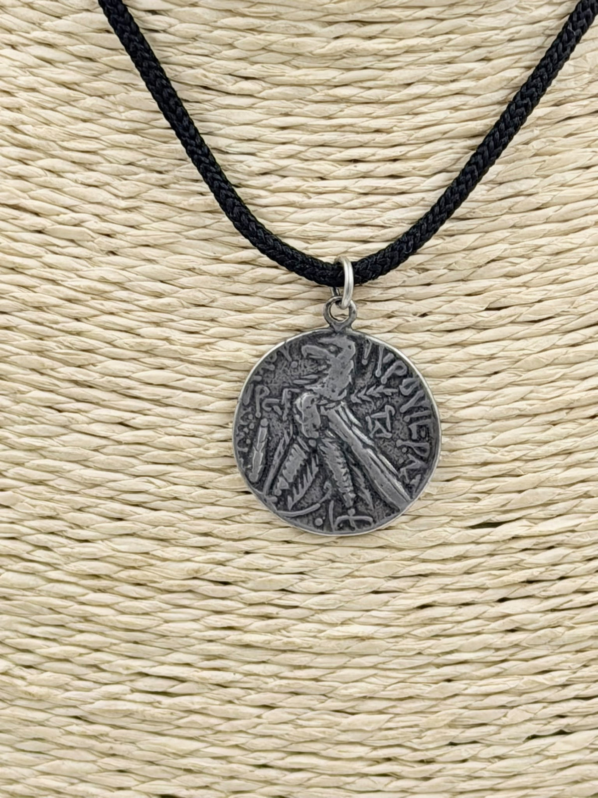 800 silver antique coin pendant necklace on wicker display