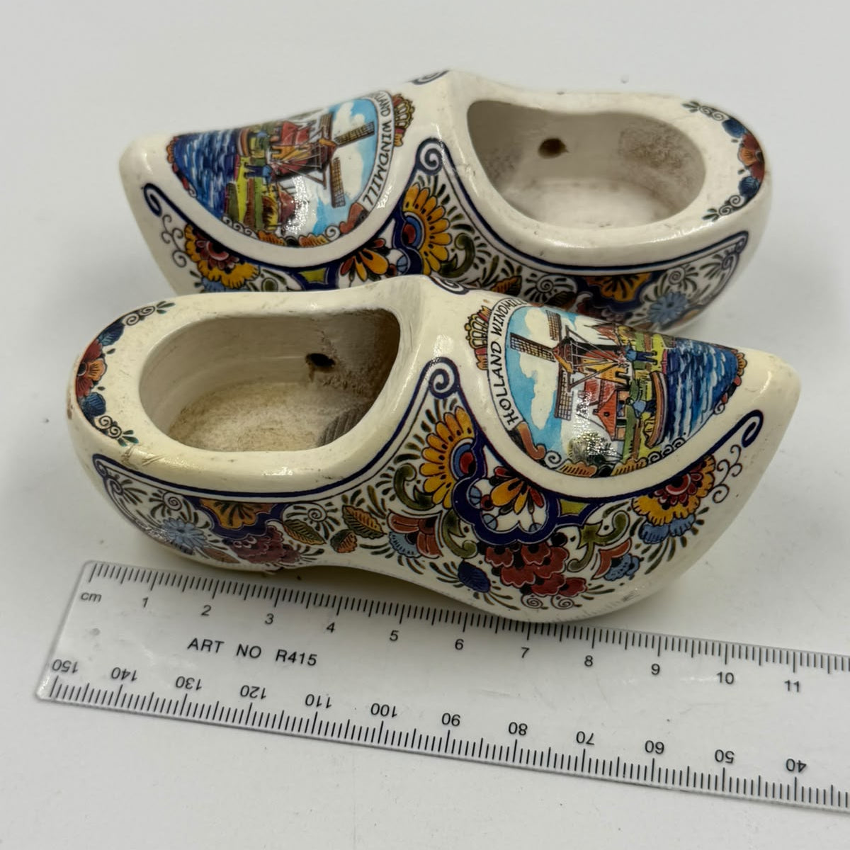 Vintage Holland Windmill ceramic clogs – held in hand