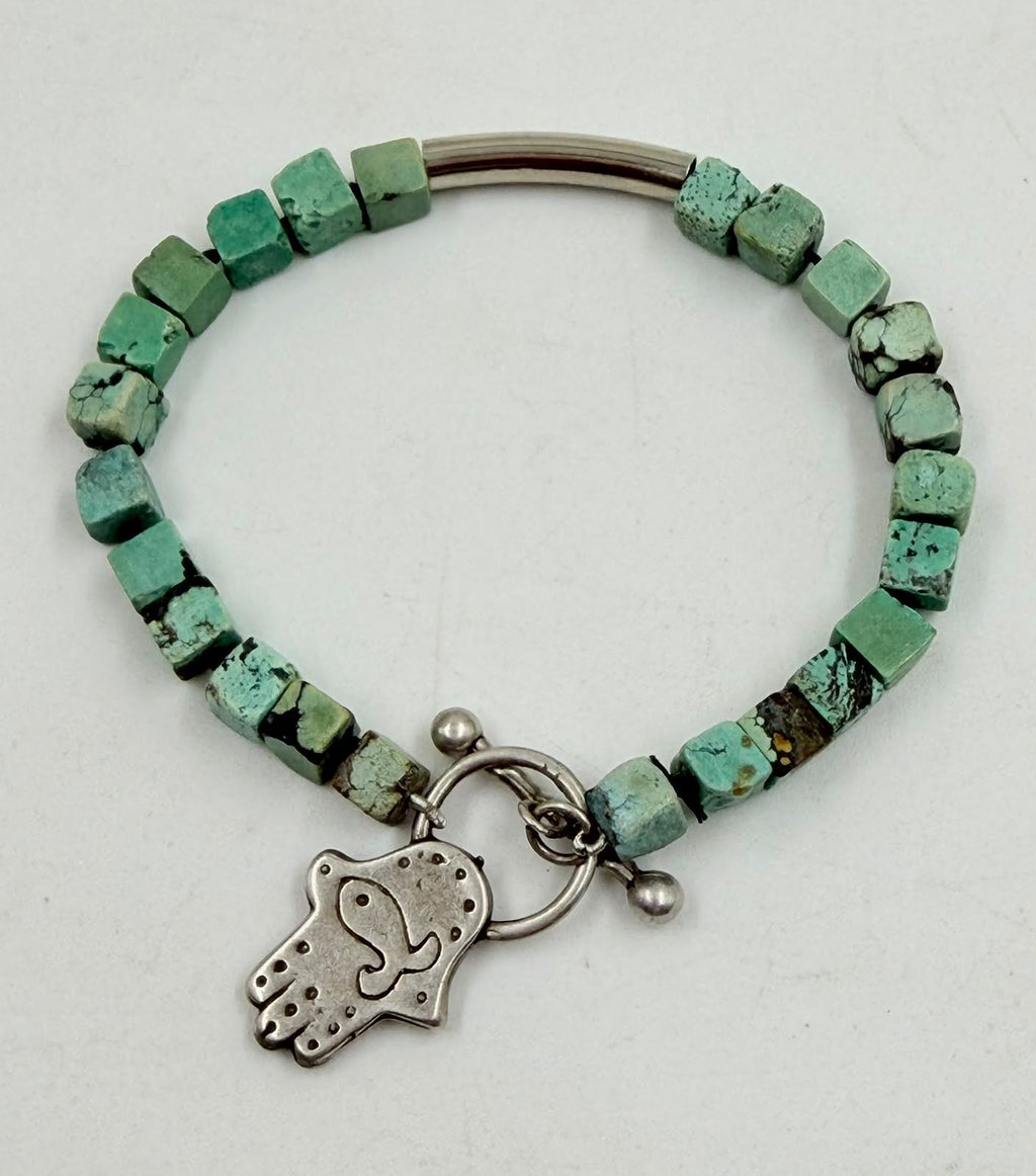 Turquoise bracelet Hamsa charm close up