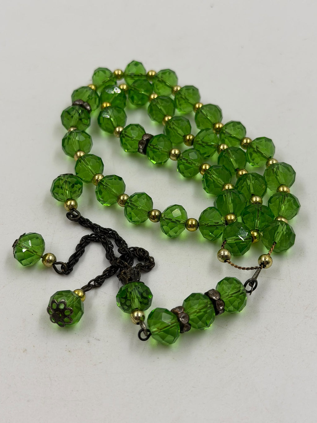 Green crystal misbaha - laid flat side view