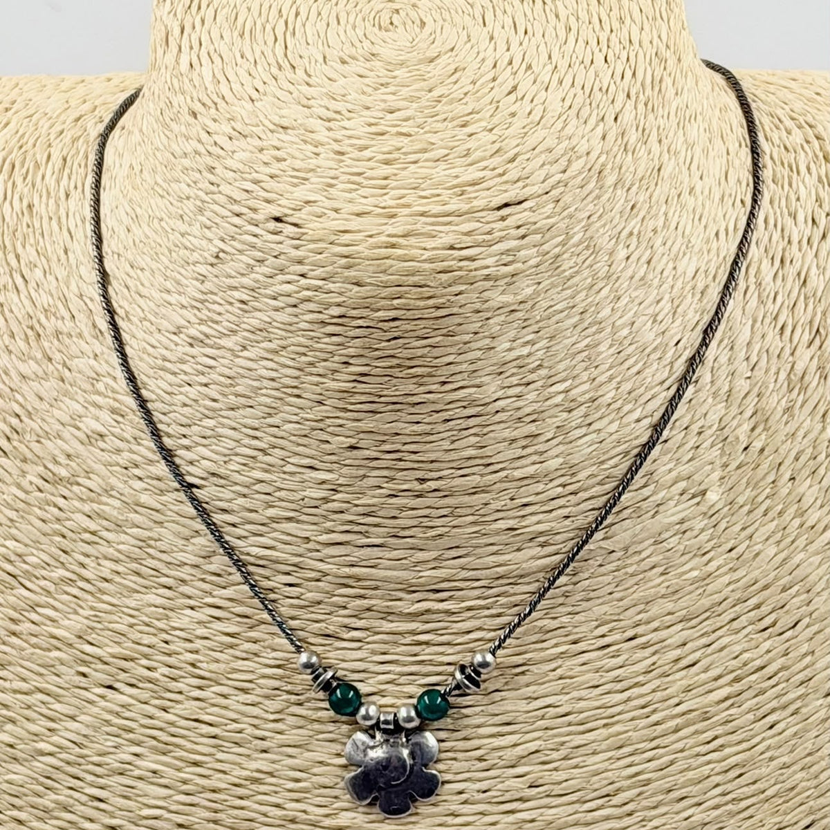 Necklace on display bust