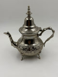 Vintage Moroccan Silver-Plated Teapot held in hand showing size
