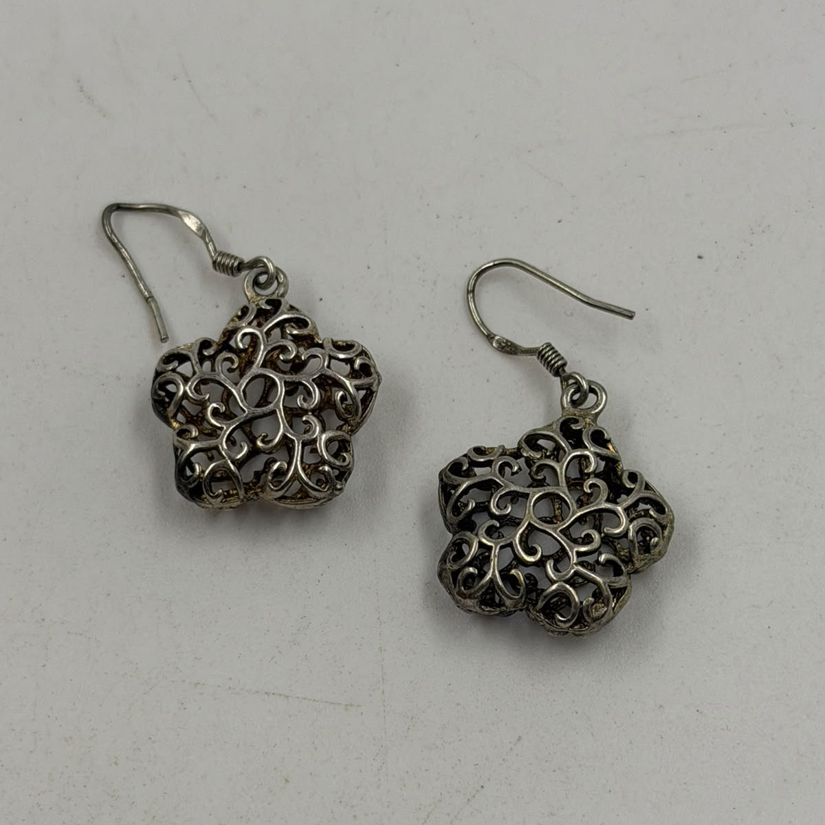 925 silver filigree flower earring single suspended showing full 3D filigree dome and hook