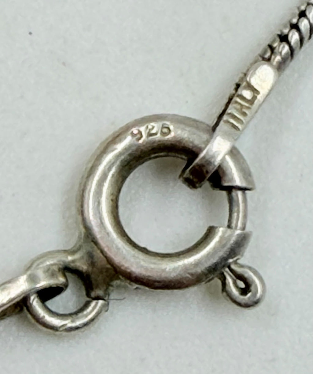 Necklace weight 5.02 grams on digital scale
