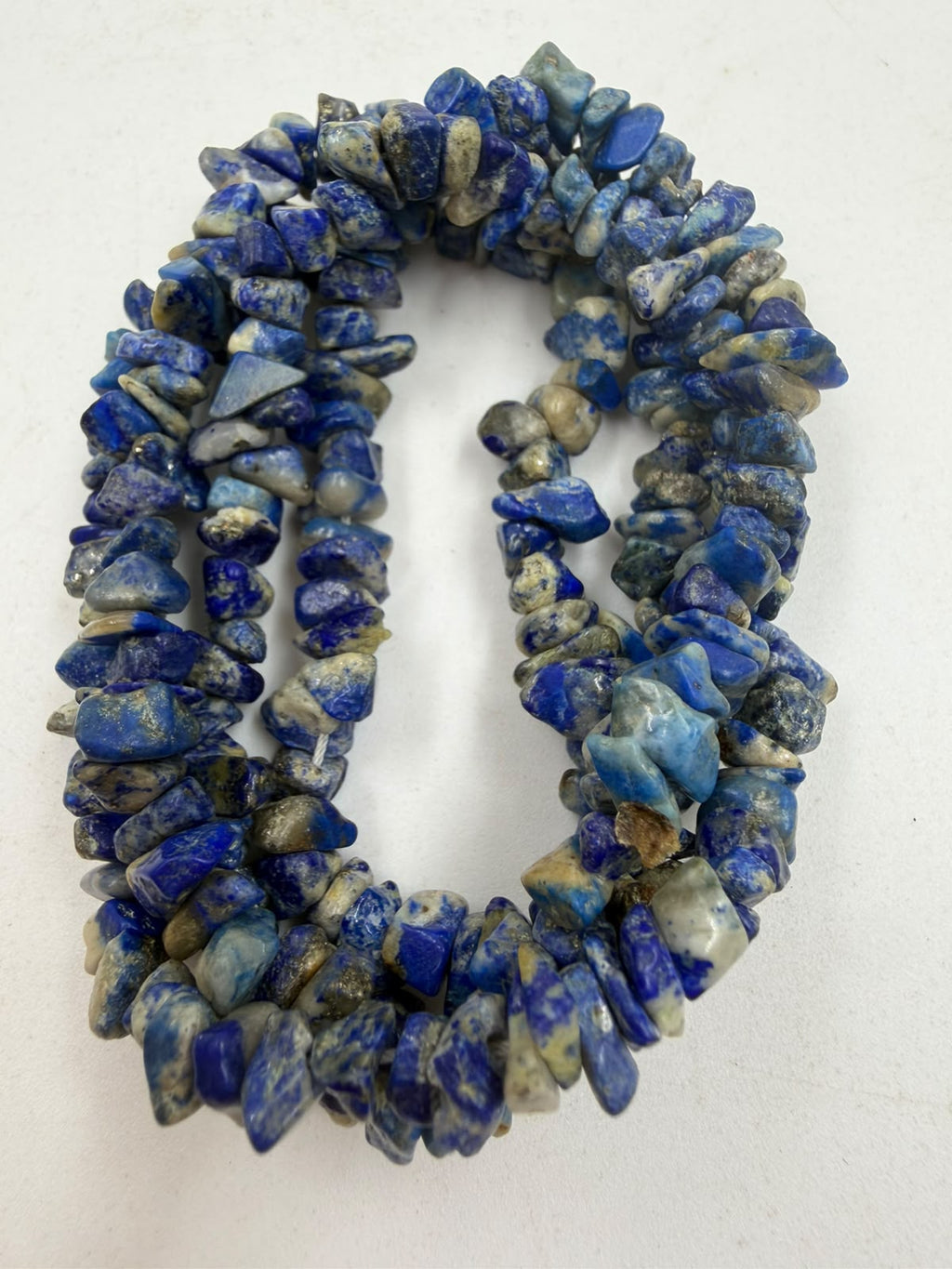 Natural lapis lazuli necklace mixed chips and rondelle beads lifestyle shot