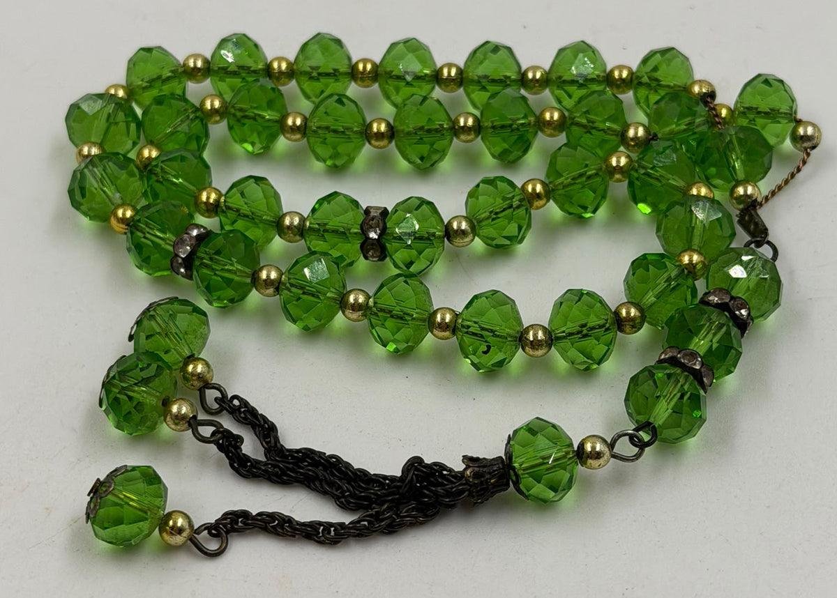 Green crystal misbaha - coiled overhead view