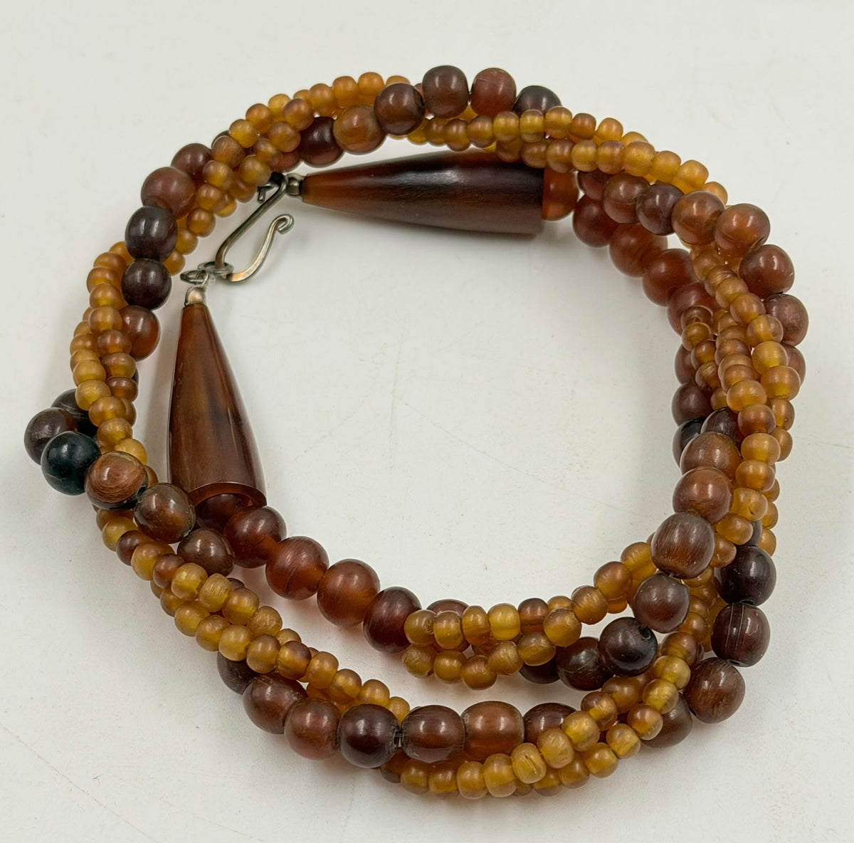Necklace coiled flat lay showing all strands