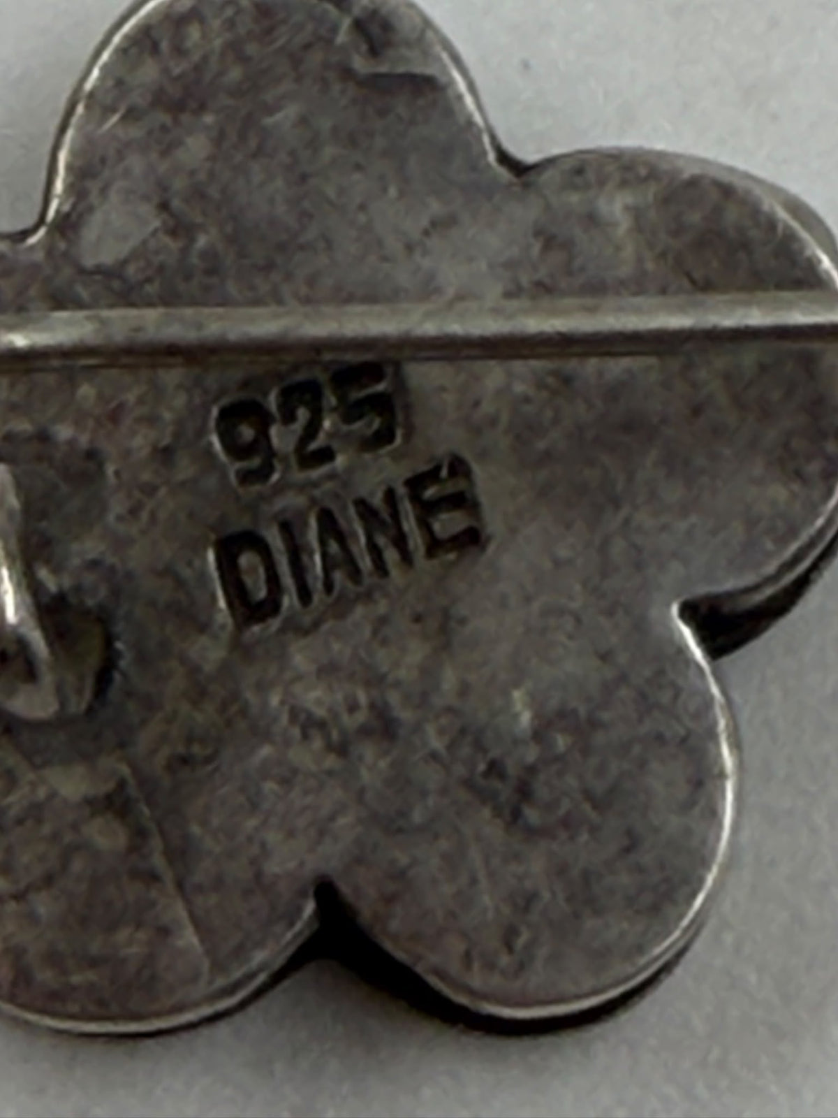 925 silver flower earrings DIANE reverse showing 925 and DIANE hallmark stamps