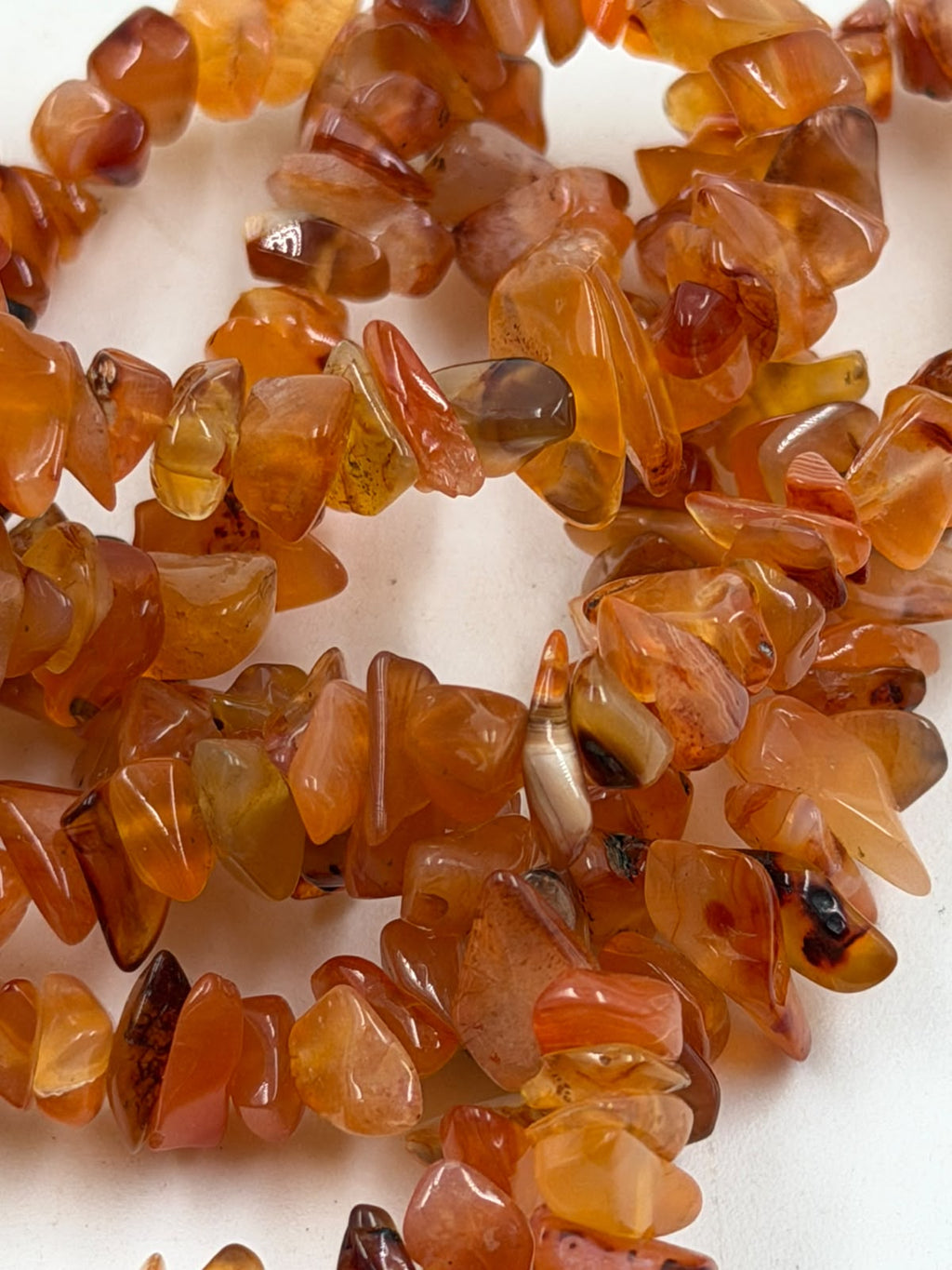 Natural carnelian chip necklace double wrap style showing layered look on white background