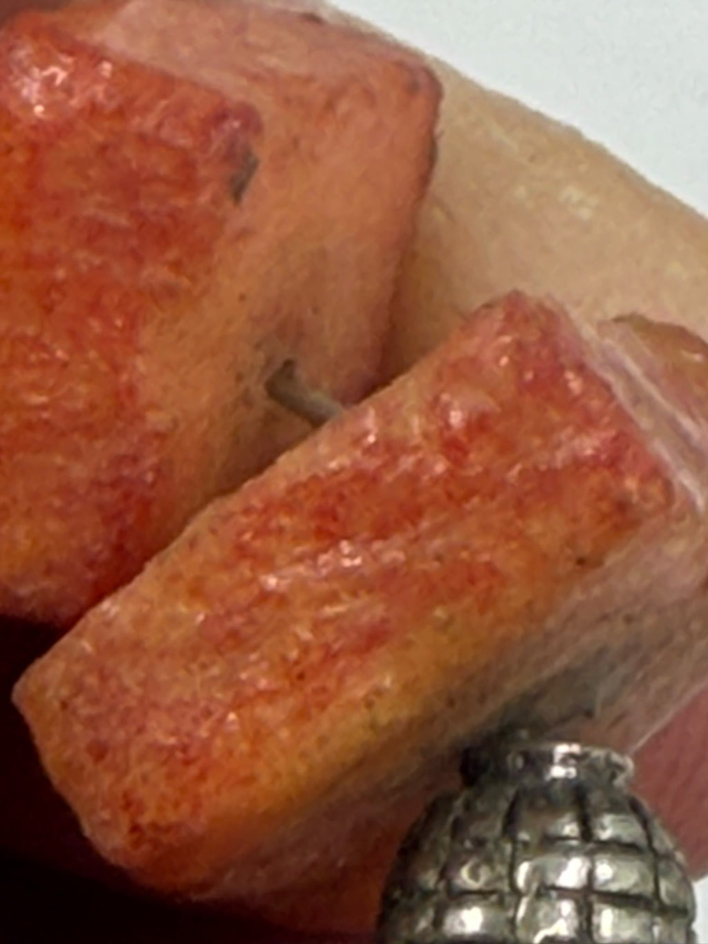 Natural coral bracelet magnetic clasp detail close-up