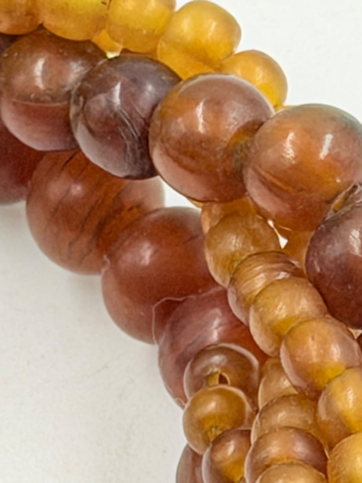 Large amber bead closeup – cognac brown tones