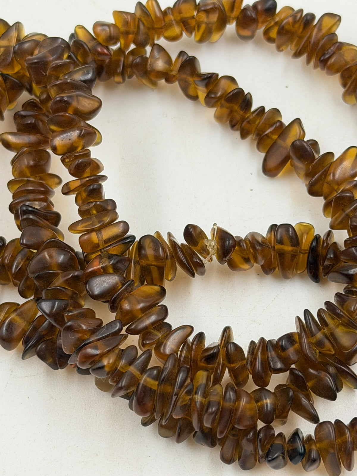 Natural brown agate chip necklace weight 58 grams on digital scale