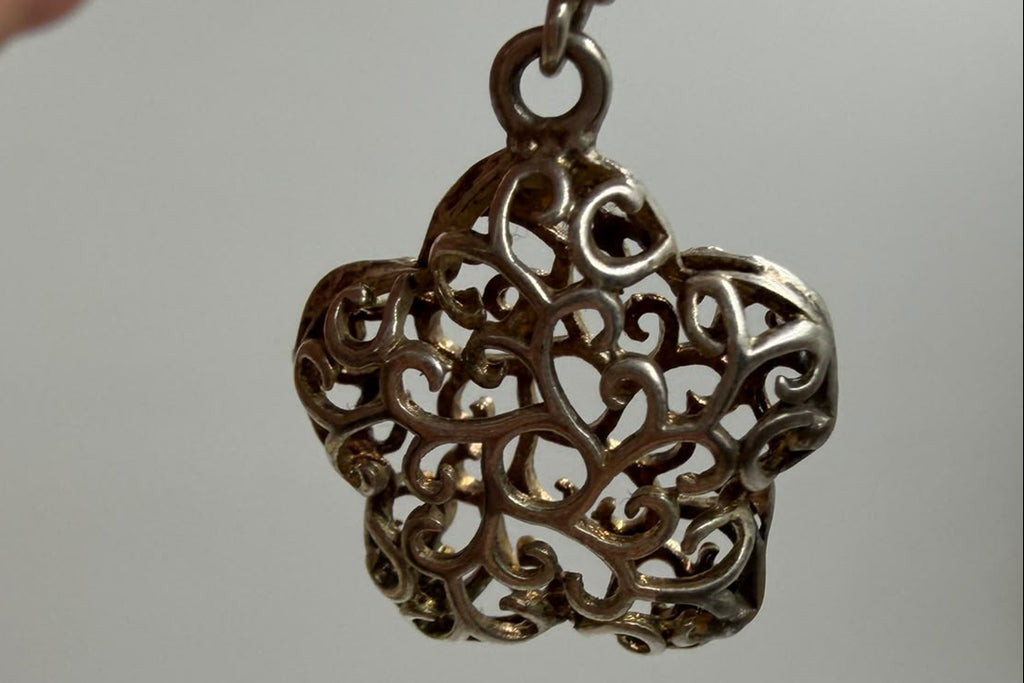 925 silver filigree flower earrings flat lay on white background both earrings showing full design