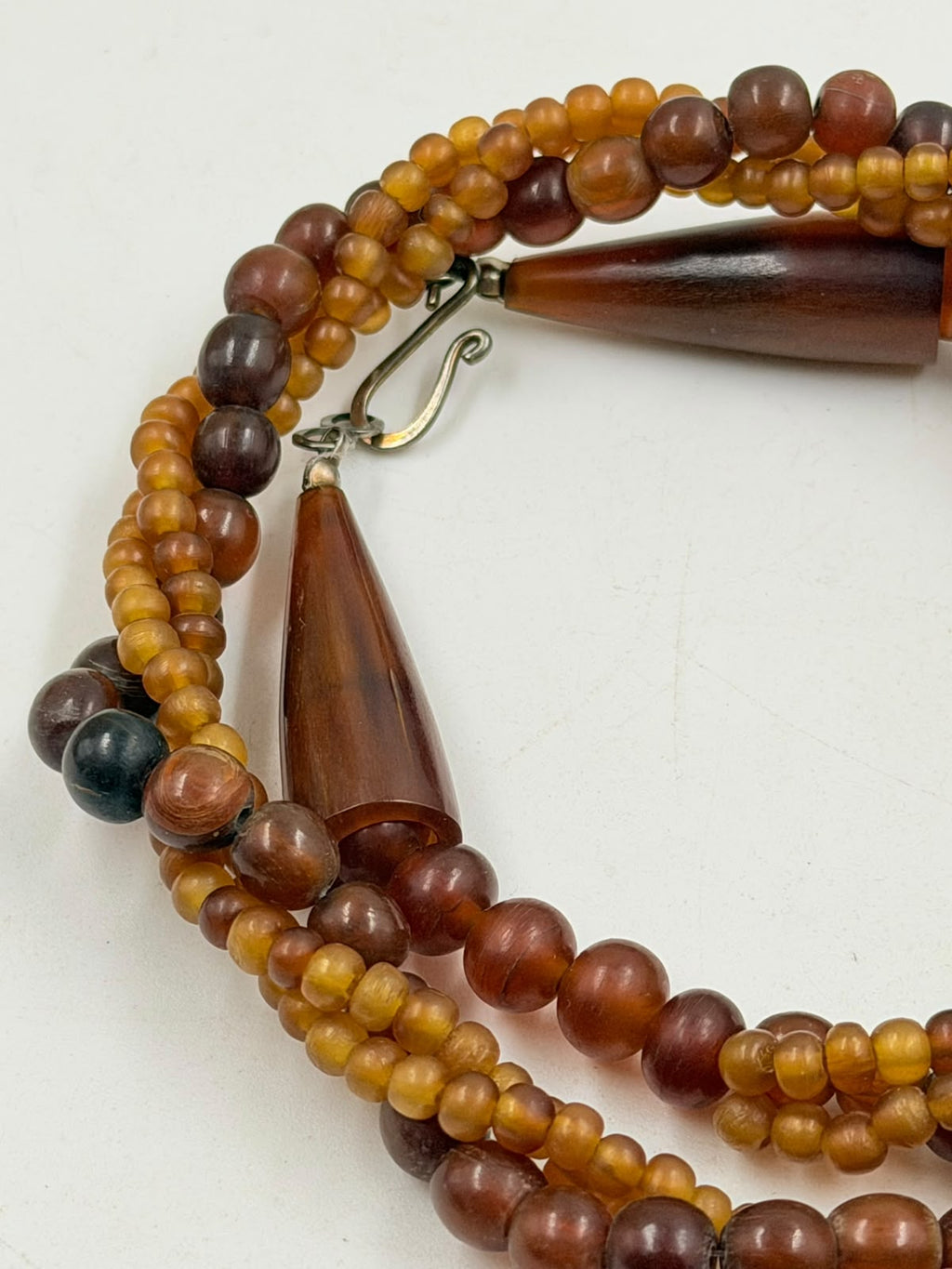 Small amber seed beads macro detail